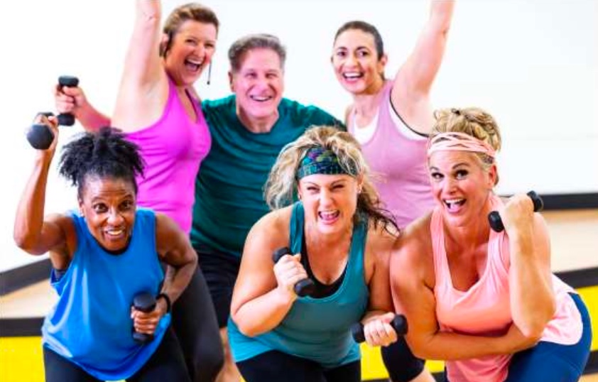 Group of people enjoying an exercise class